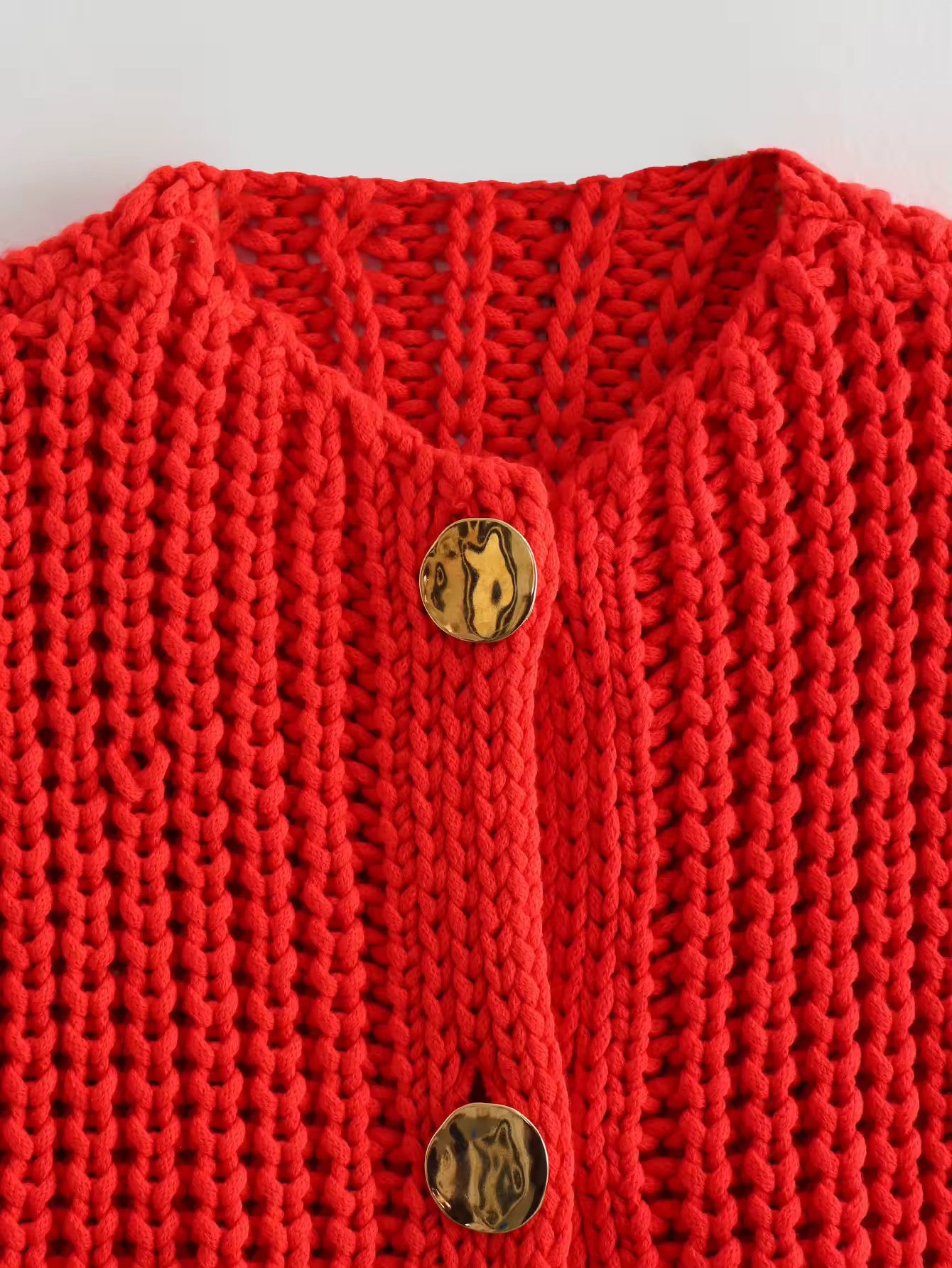 GILET IN MAGLIA CON BOTTONI ORO