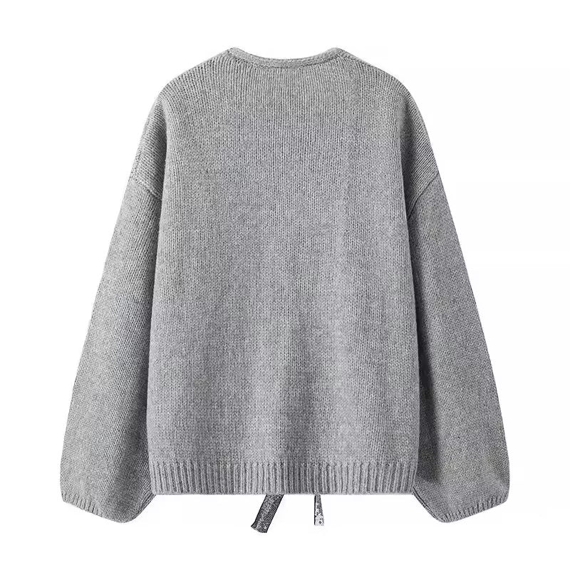 CARDIGAN TRICOTÉ À PAILLETTES AVEC NŒUD