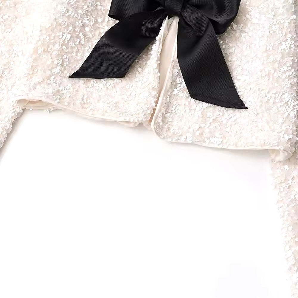 Giacca corta con paillettes • Donna