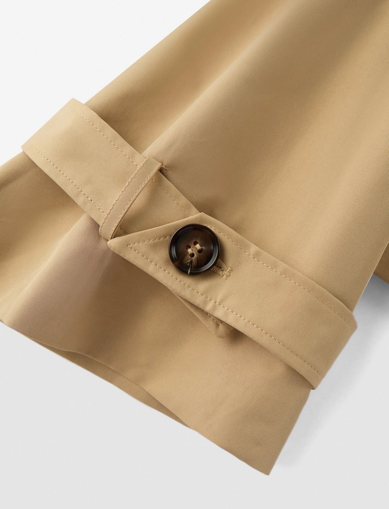 VESTE COURTE DOUBLE-BOUTONNAGE À NOEUD