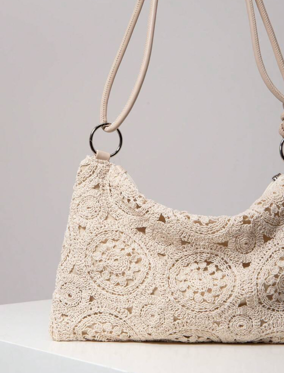 SAC À MAIN TRESSÉ À MOTIF FLORAL