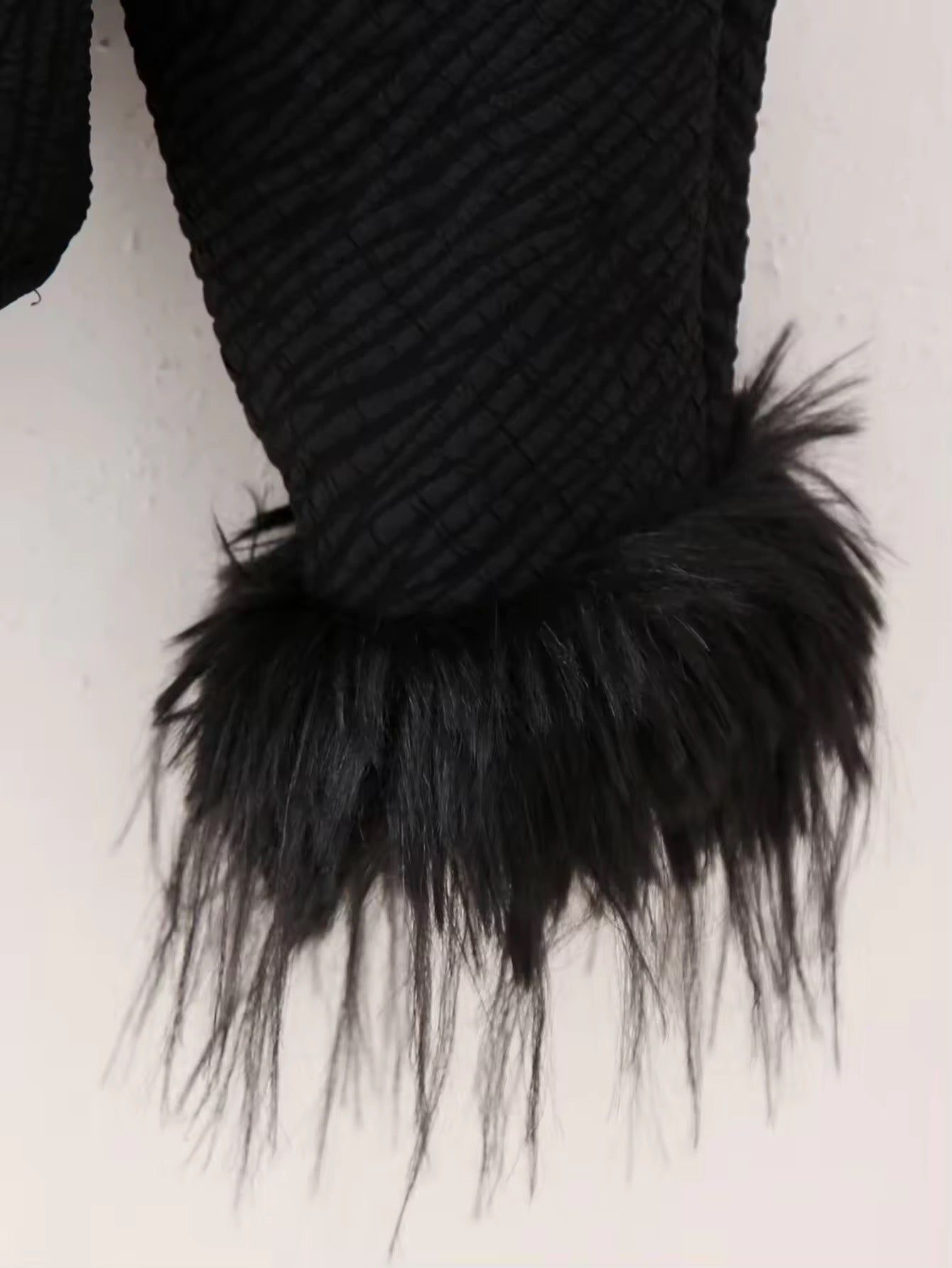 VESTE TEXTURÉE À NOEUDS ET MANCHES PLUMETÉES
