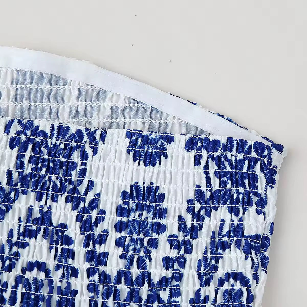 TOP BUSTIER À SMOCKS ET VOLANTS