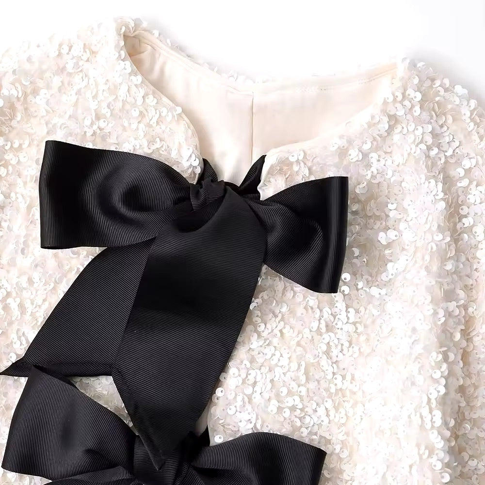 Giacca corta con paillettes • Donna