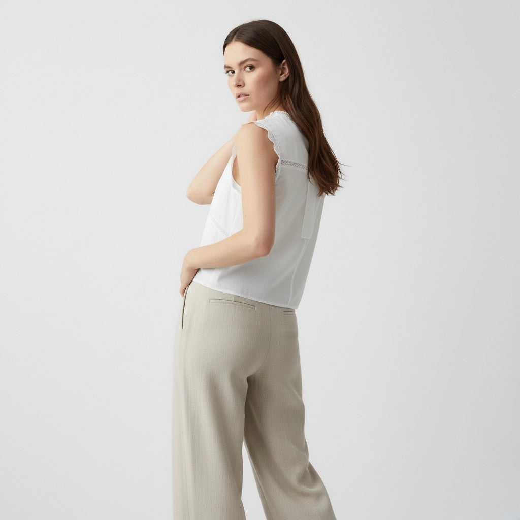 BLUSA CON LACCI RICAMATI