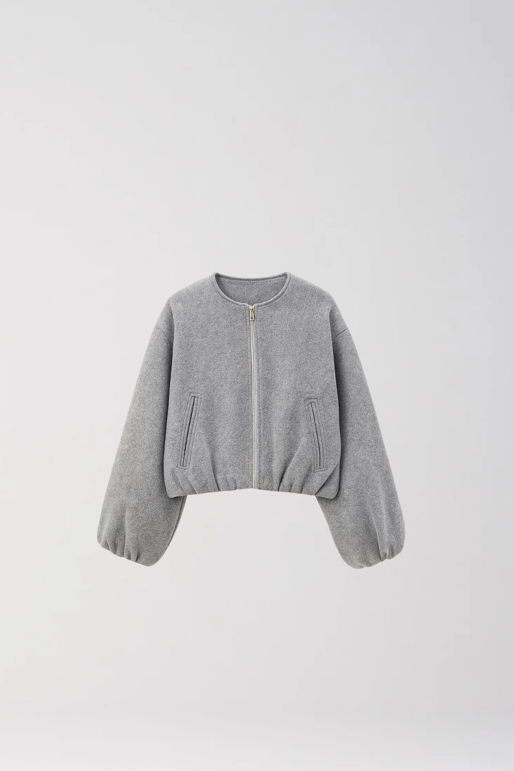 BLOUSON ZIPPÉ AVEC BASE ÉLASTIQUÉE