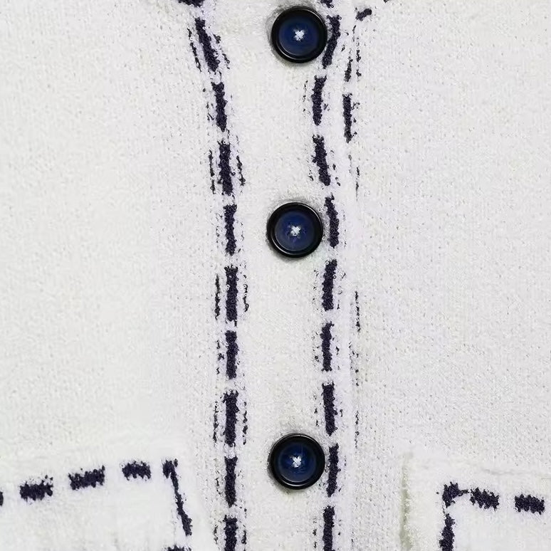 GILET COURT À BOUTONS FACETÉS