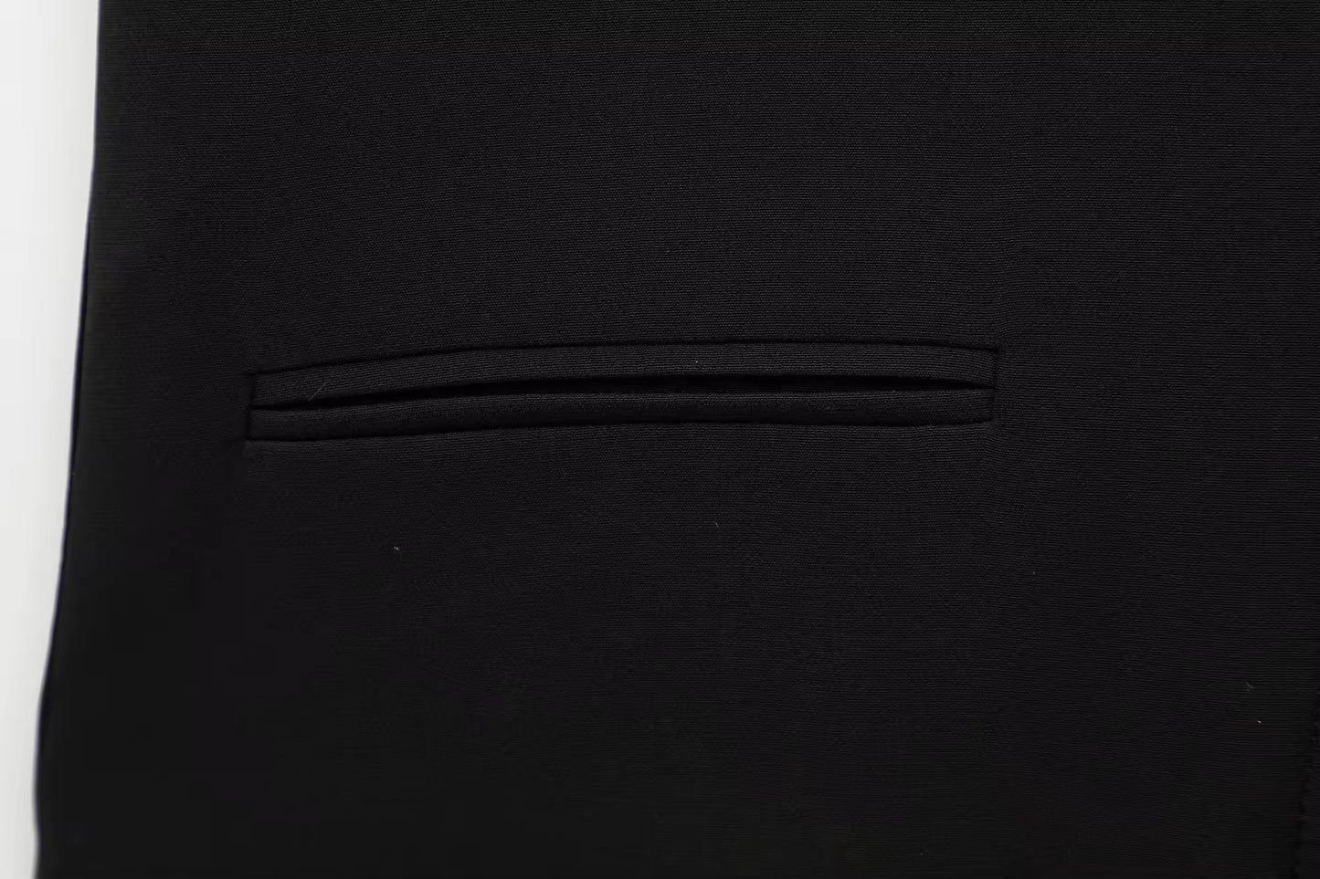 VESTE COURTE À COL REVERS