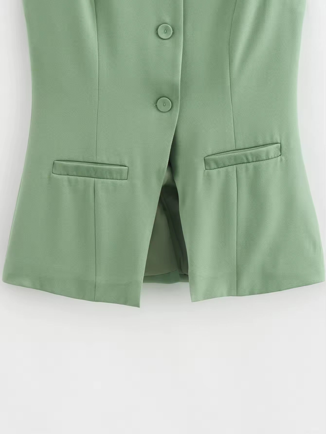 GILET MI-LONG SANS MANCHES