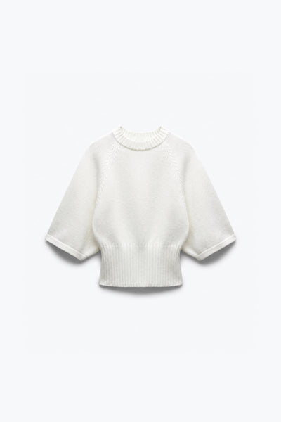PULL EN MAILLE À TAILLE CINTRÉE
