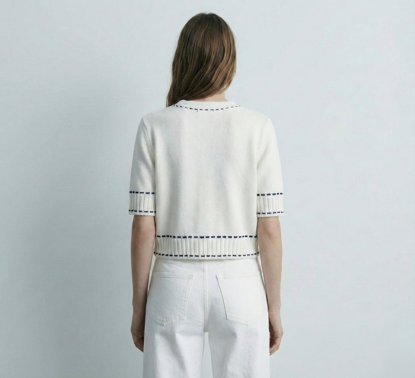 GILET COURT À BOUTONS FACETÉS