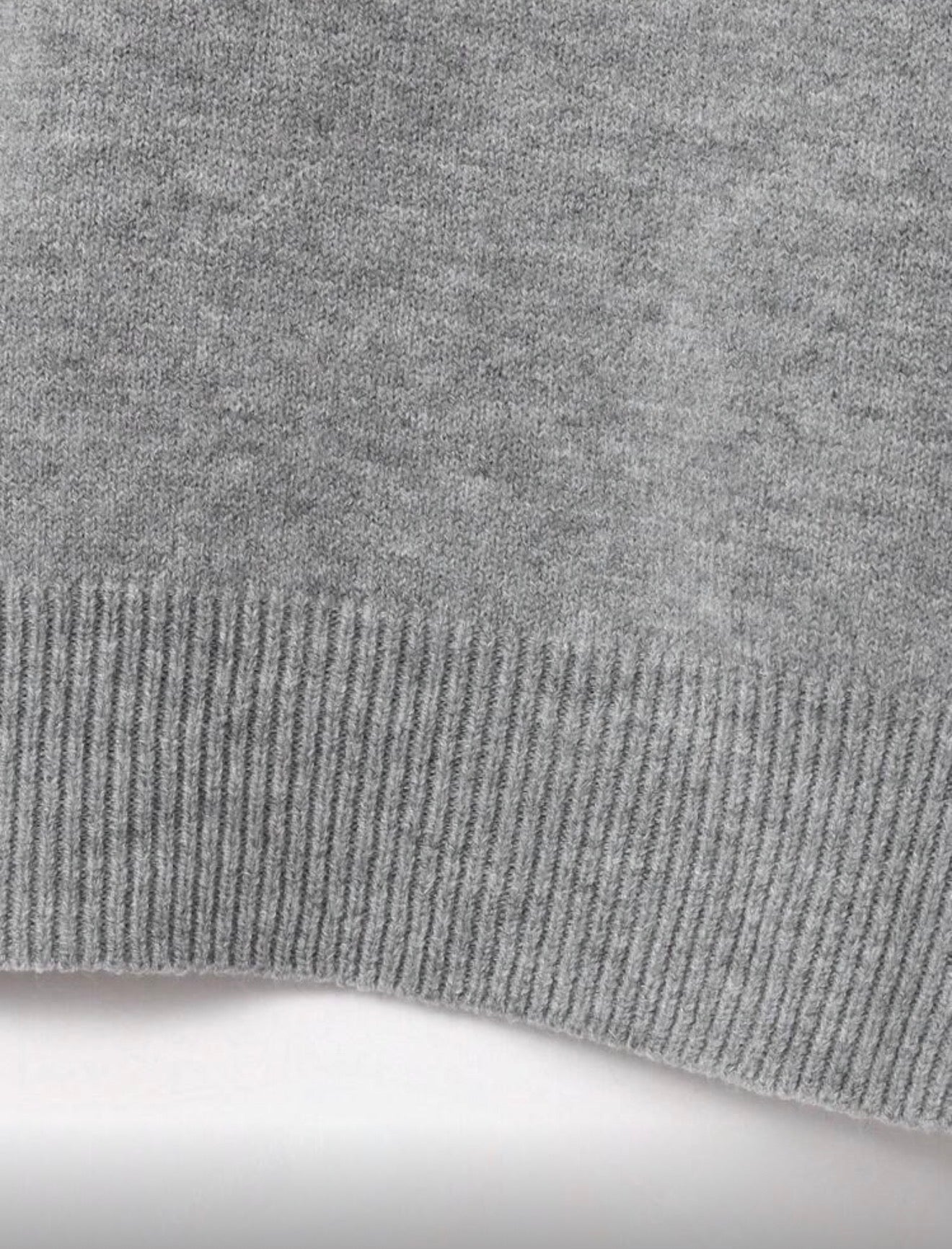 TOP EN MAILLE À MANCHES COURTES