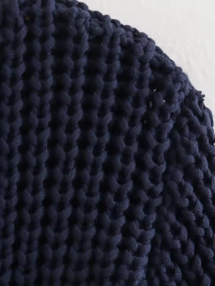 GILET EN TRICOT À BOUTONS DORÉS