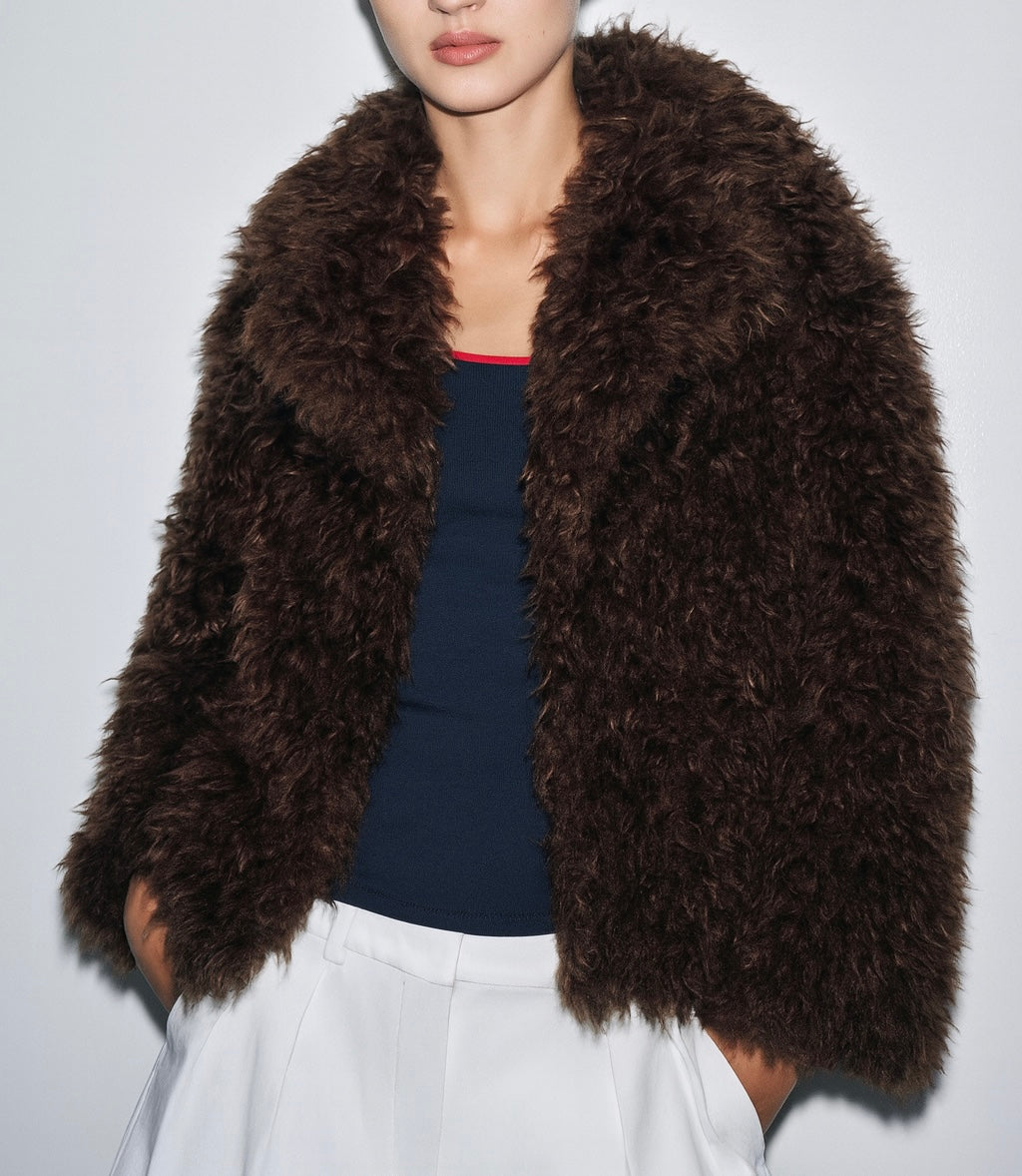 VESTE EFFET FOURRURE BOUCLÉE