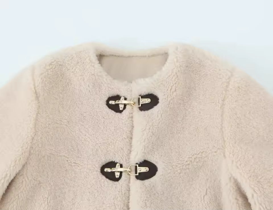 VESTE EN BOUCLETTE AVEC FERMETURES CLIP MÉTAL