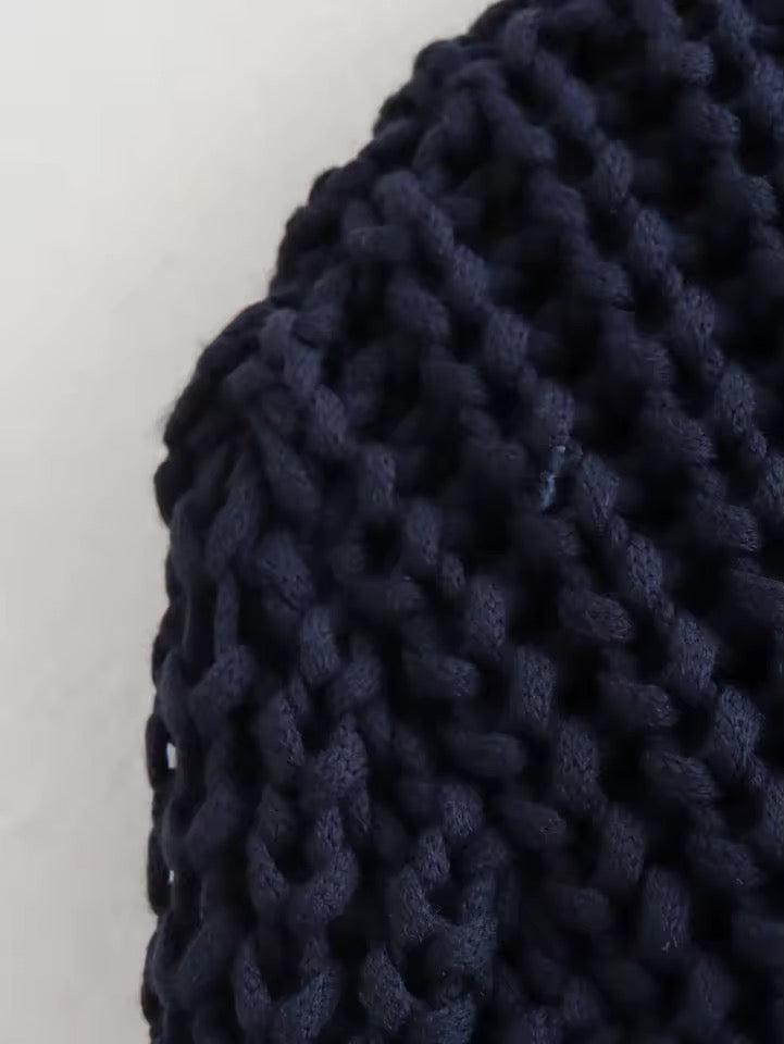 GILET EN TRICOT À BOUTONS DORÉS