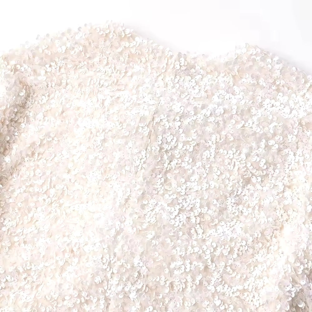 Giacca corta con paillettes • Donna
