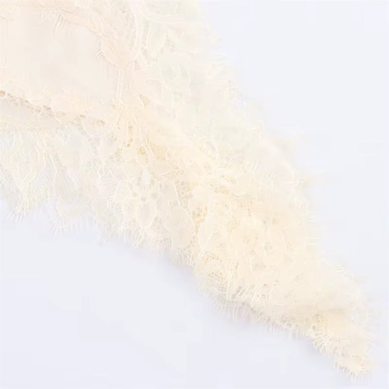 ROBE ASYMÉTRIQUE EN DENTELLE