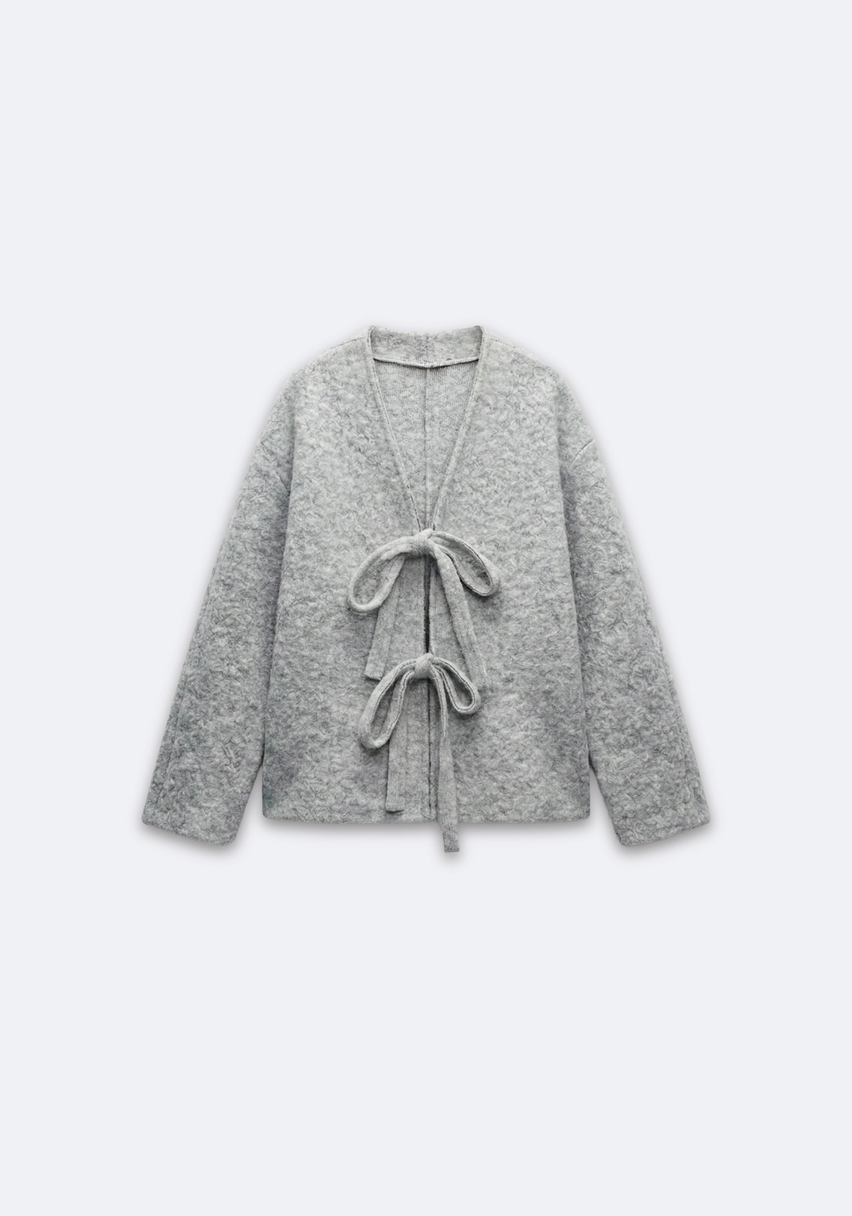 VESTE TEXTURÉE À NOEUDS FRONTAUX