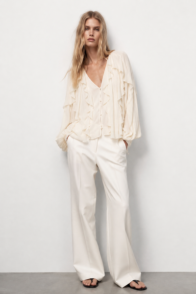 BLOUSE VOLANTÉE COL V MANCHES BOUFFANTES