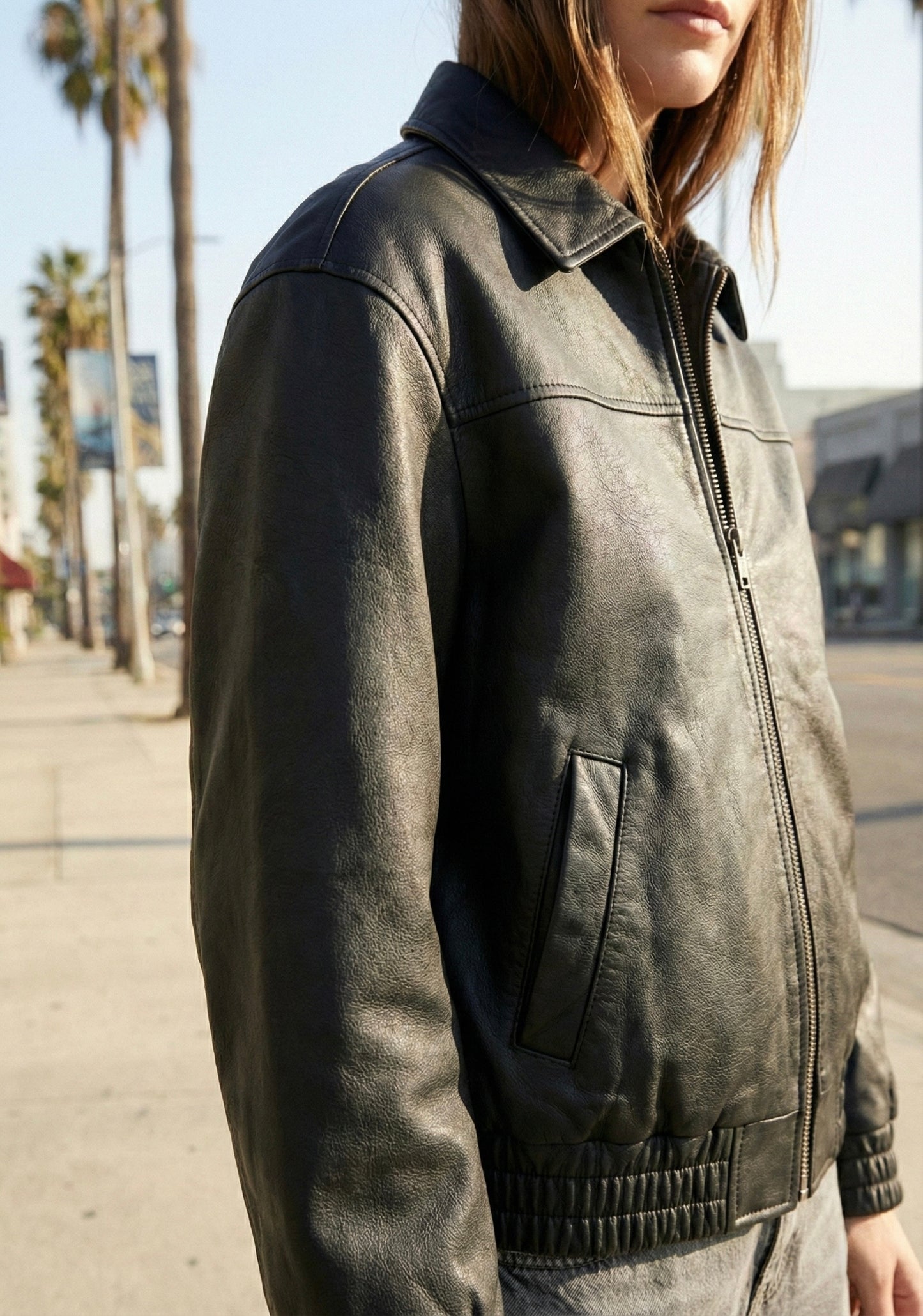 BLOUSON ZIPPÉ À POCHES GÉOMÉTRIQUES