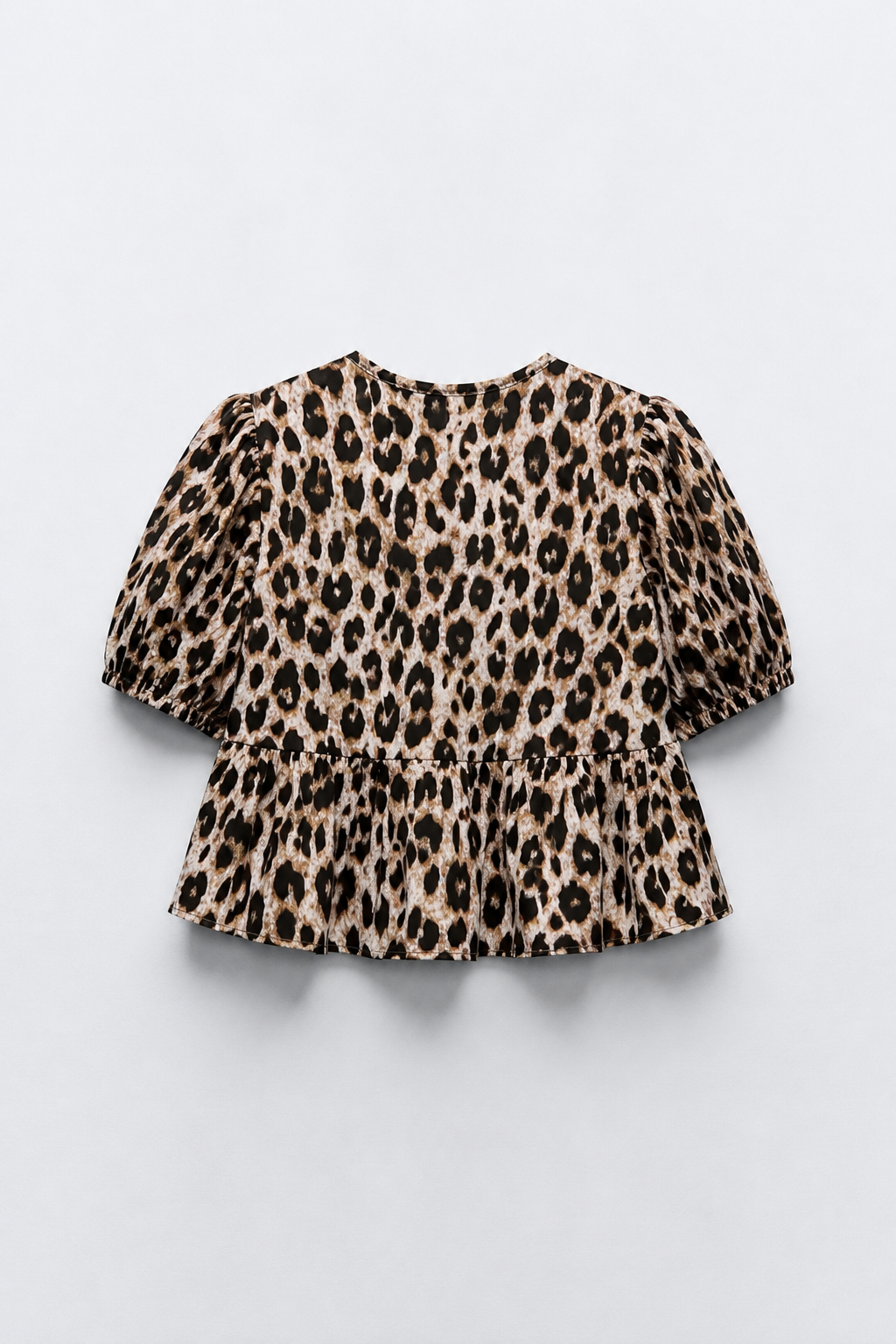 BLOUSE COURTE COL ROND MANCHES BOUFFANTES