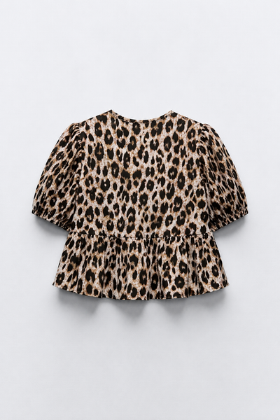 BLOUSE COURTE COL ROND MANCHES BOUFFANTES