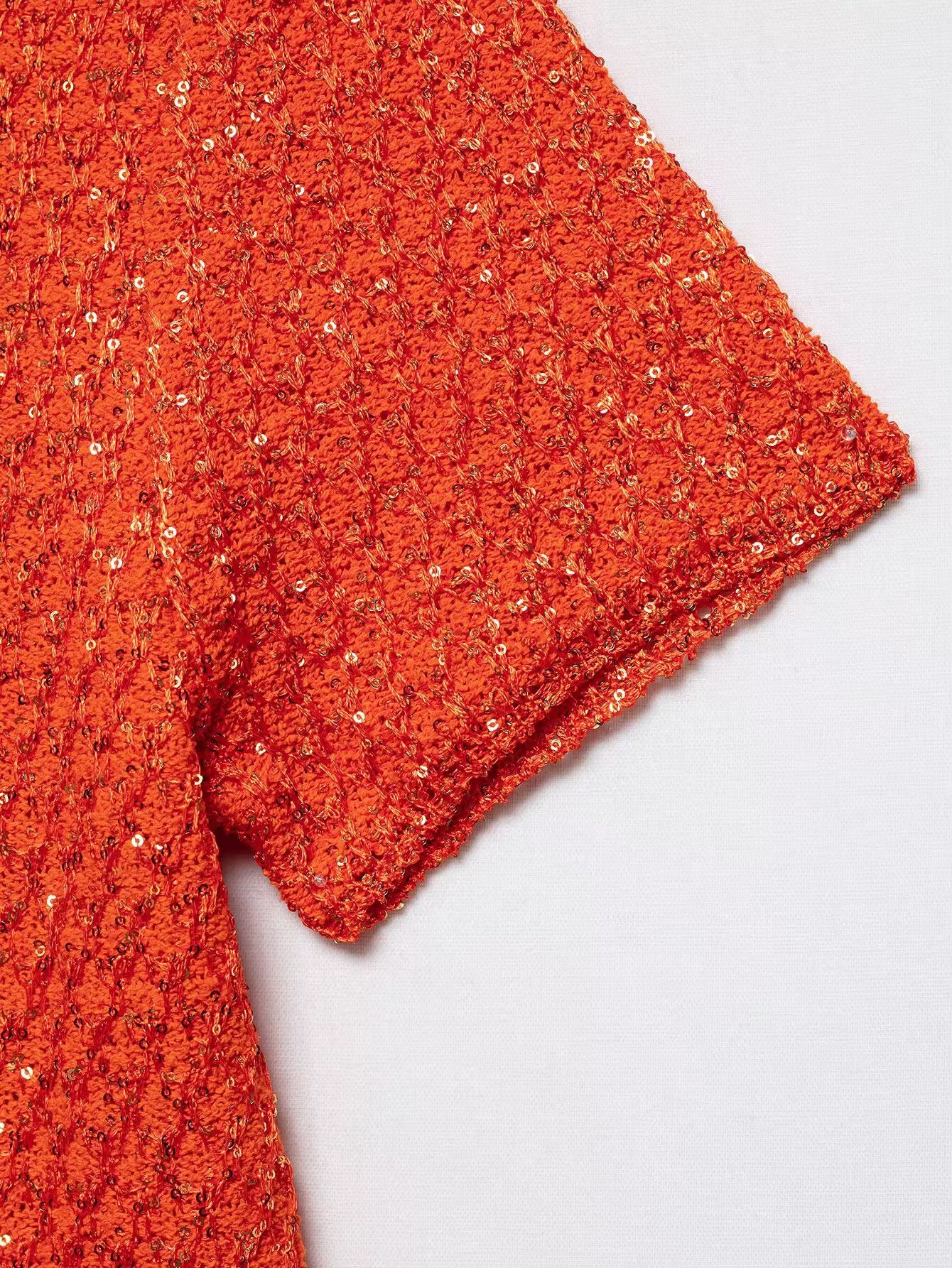 TOP IN MAGLIA CON PAILLETTES