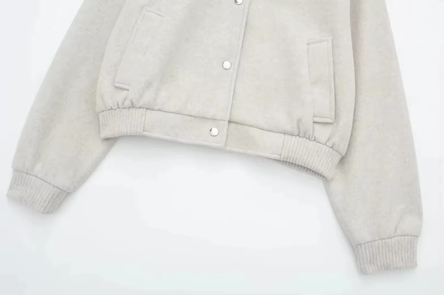 Blouson bombardier court avec bouton métallique