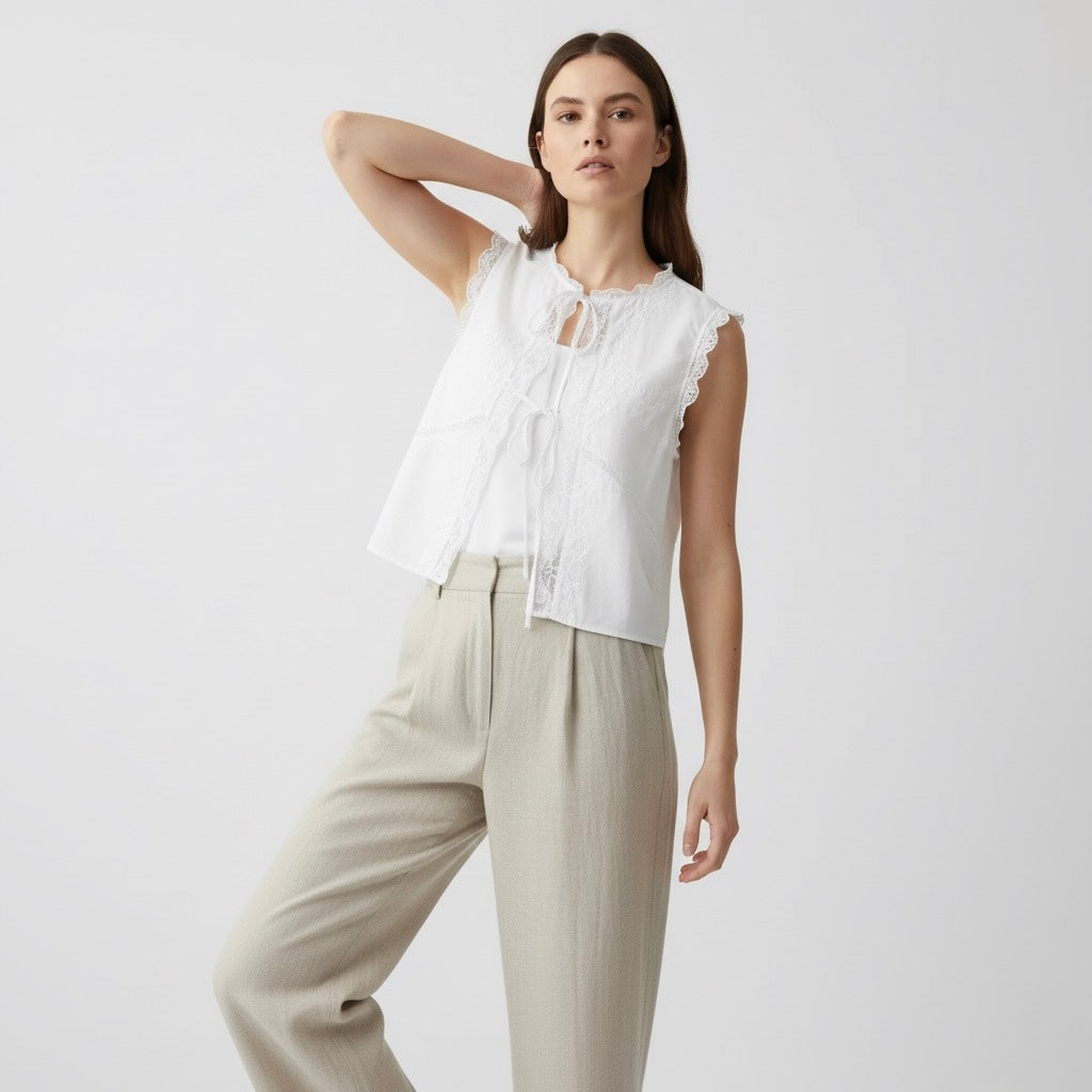 BLUSA CON LACCI RICAMATI