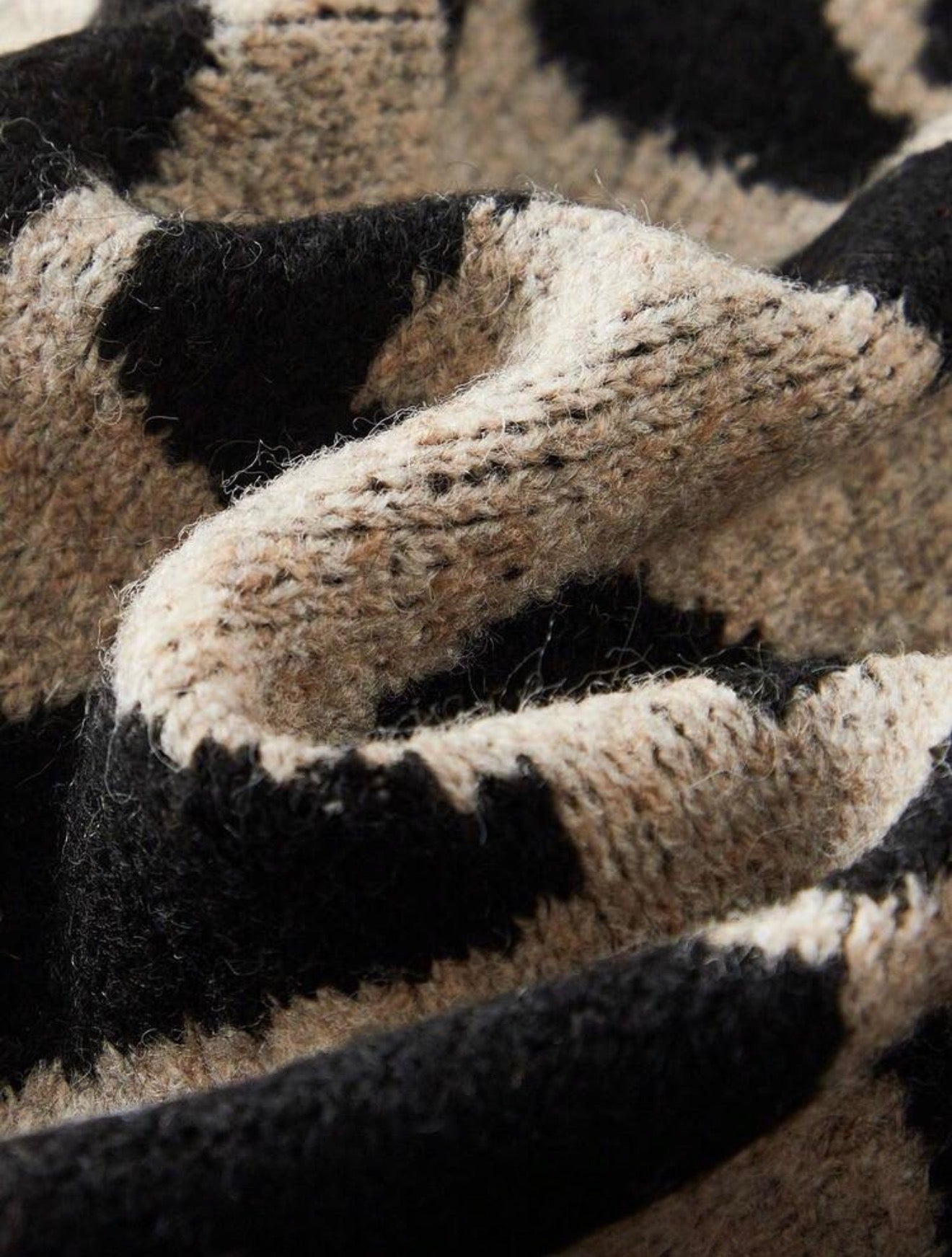 GILET TEXTURÉ À MOTIFS LÉOPARD