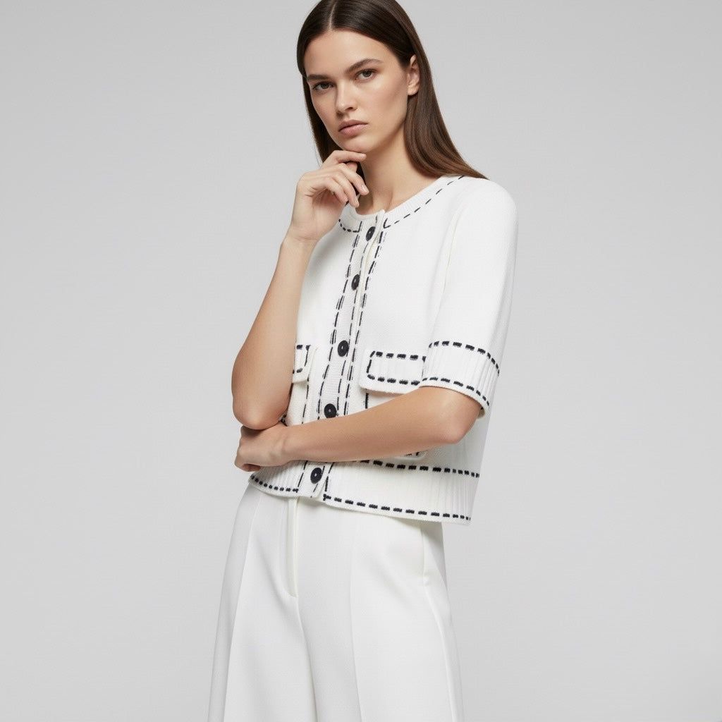 GILET COURT À BOUTONS FACETÉS