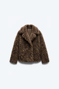 MANTEAU EFFET FOURRURE BOUCLÉE