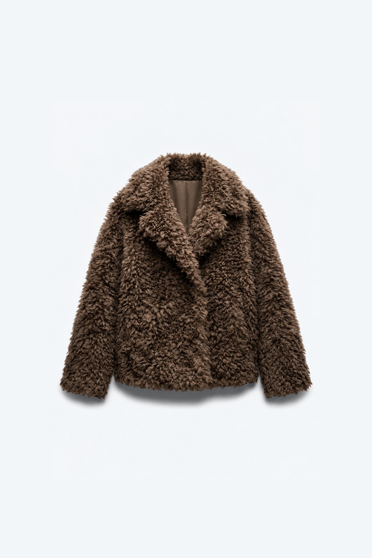 MANTEAU EFFET FOURRURE BOUCLÉE