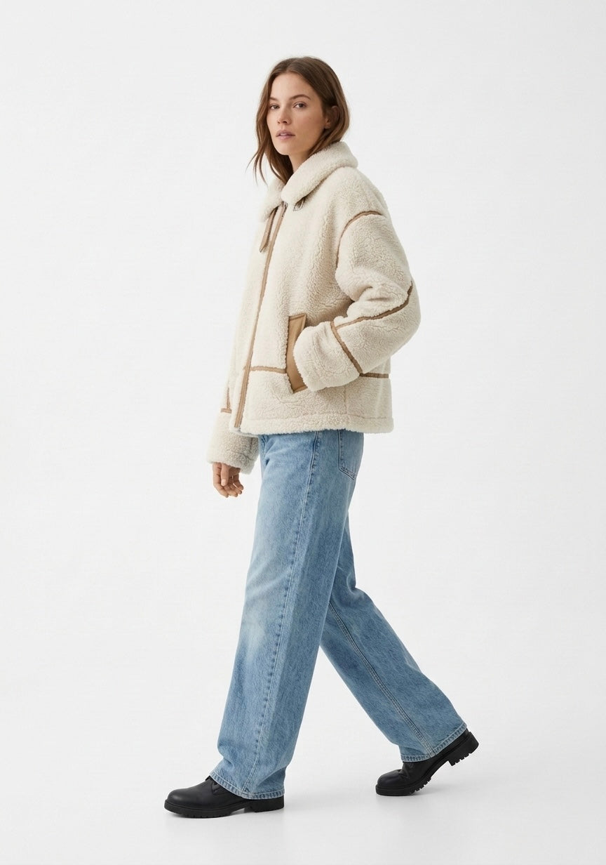 VESTE EFFET LAINE AVEC DÉTAILS CONTRASTÉS