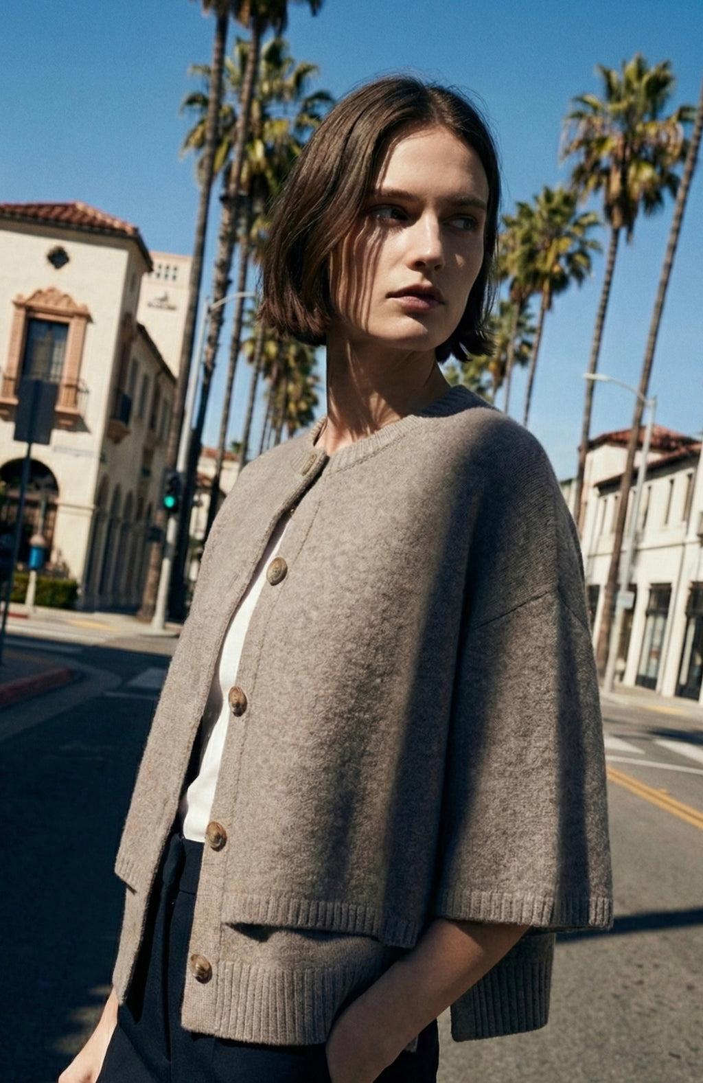 PONCHO CARDIGAN IN MAGLIA