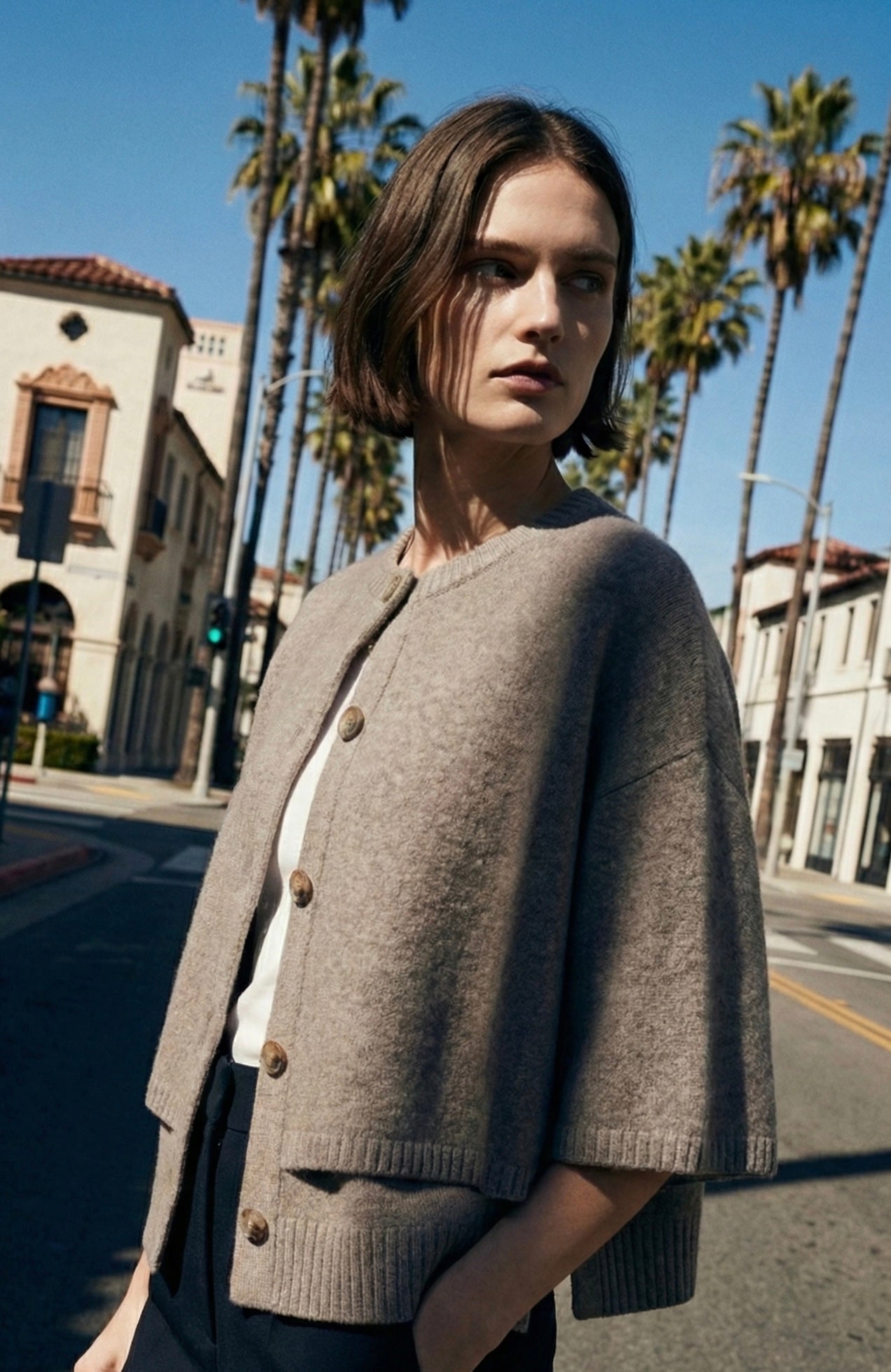 PONCHO CARDIGAN IN MAGLIA