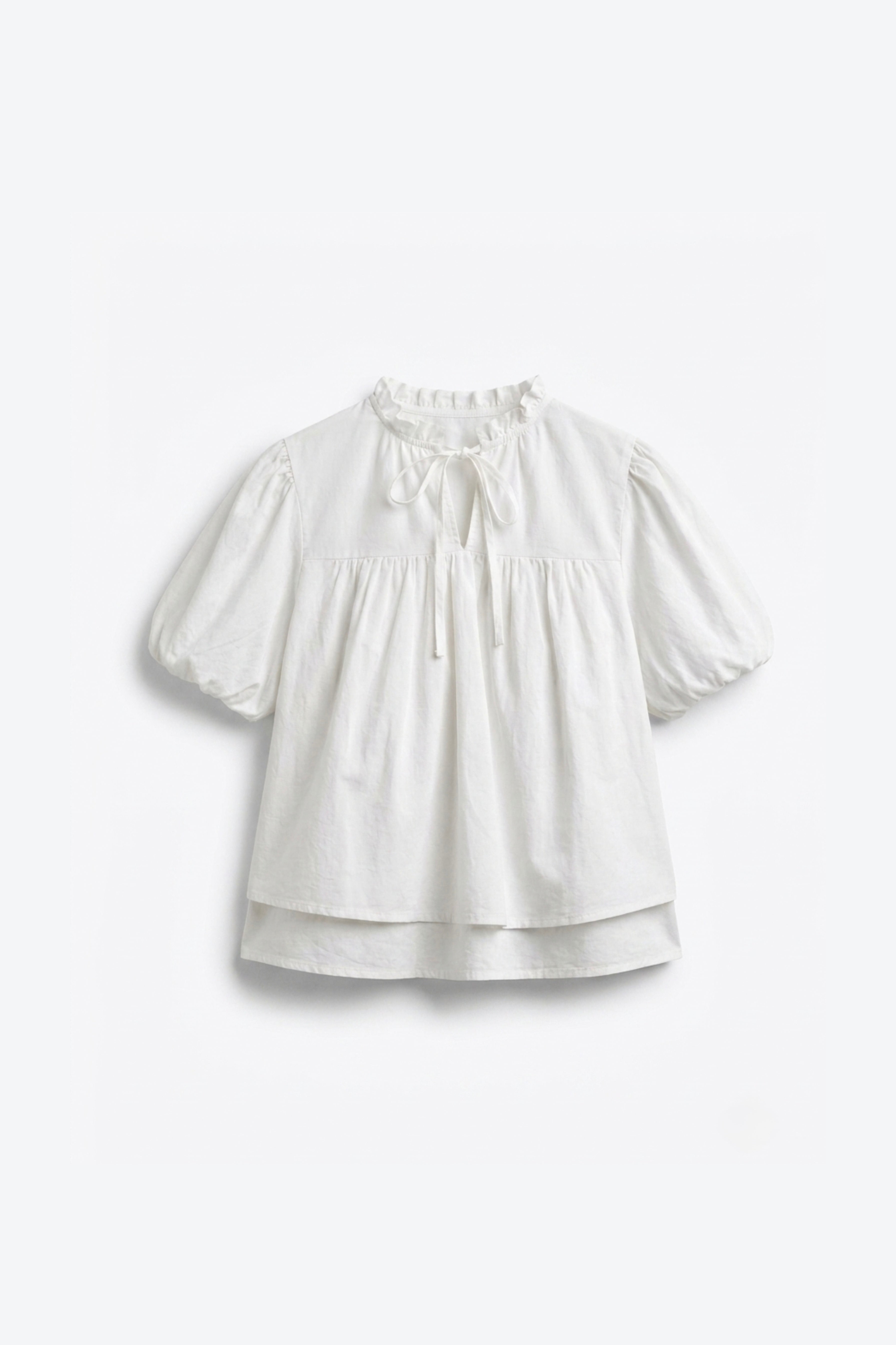 BLOUSE MANCHES BOUFFANTES COL NOUÉ