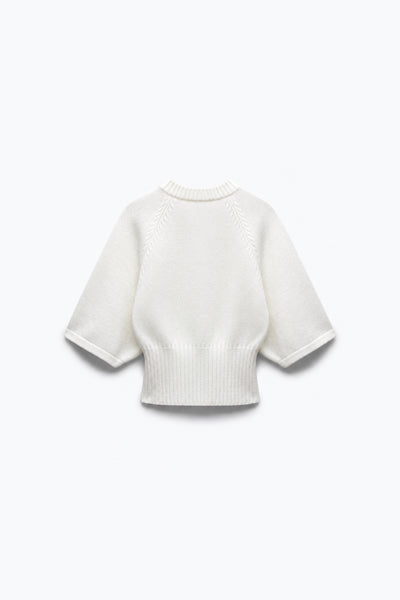 PULL EN MAILLE À TAILLE CINTRÉE