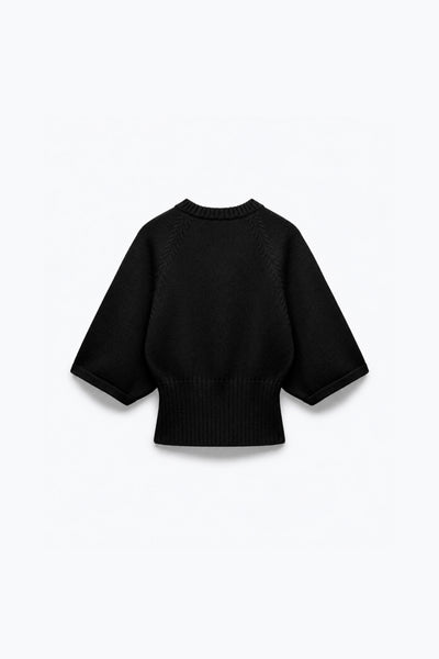 PULL EN MAILLE À TAILLE CINTRÉE