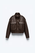 BLOUSON COURT À POCHES PLAQUÉES