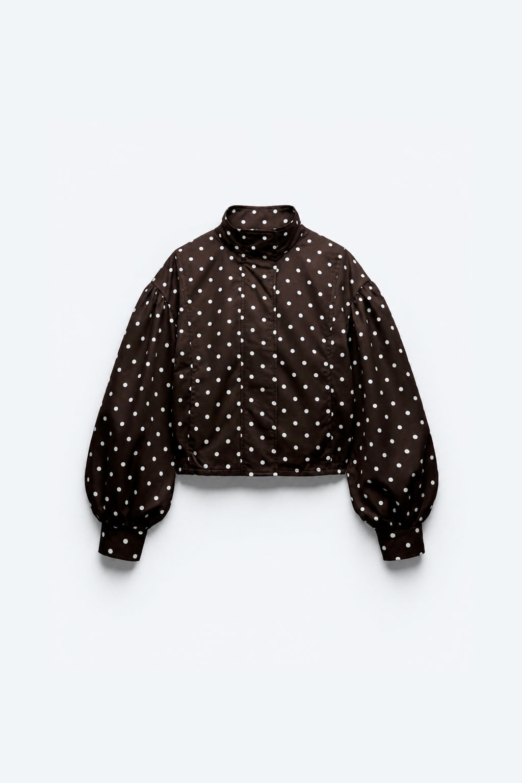 VESTE COURTE À POIS ET MANCHES BOUFFANTES