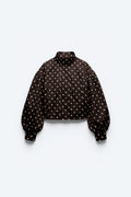 VESTE COURTE À POIS ET MANCHES BOUFFANTES