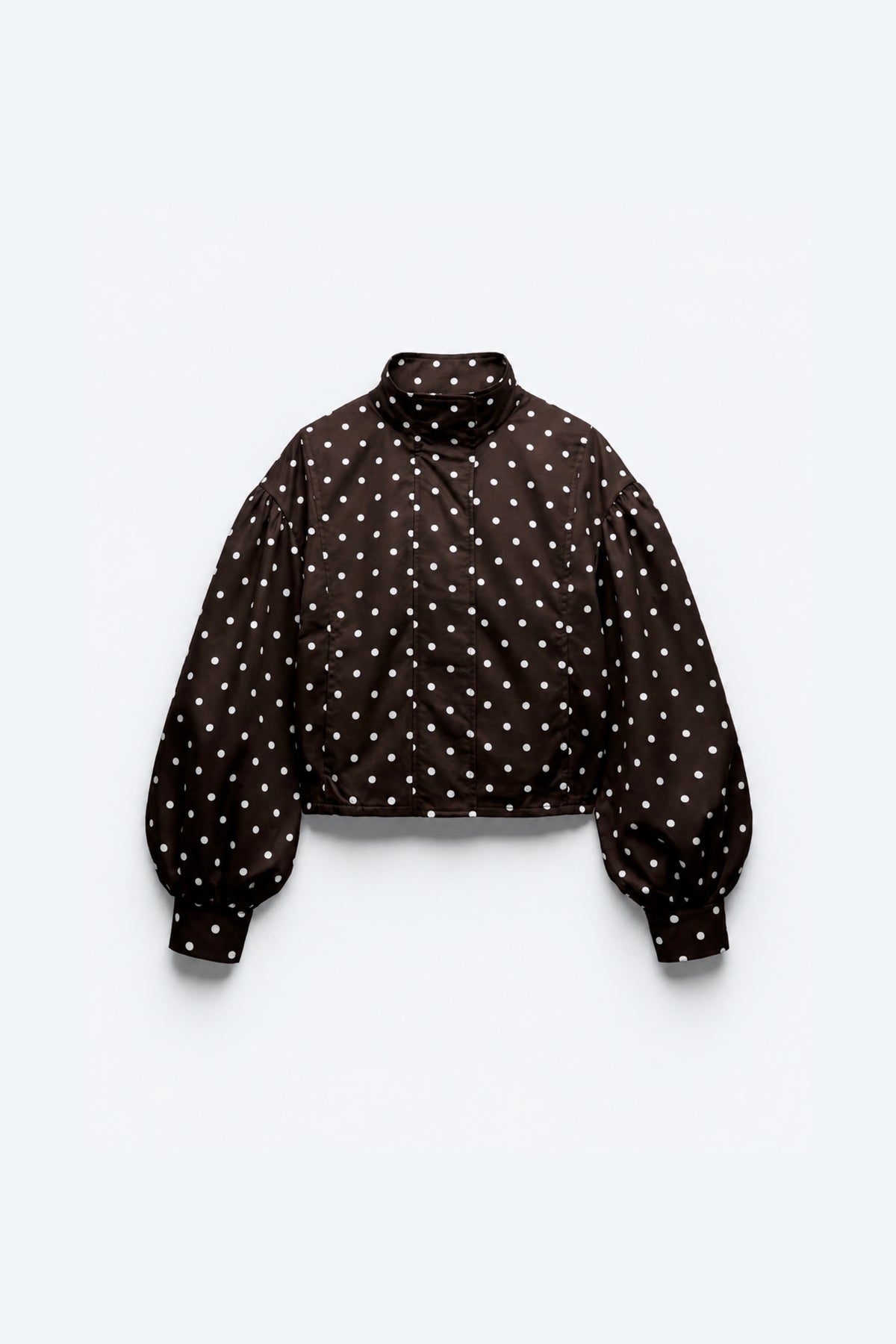 VESTE COURTE À POIS ET MANCHES BOUFFANTES