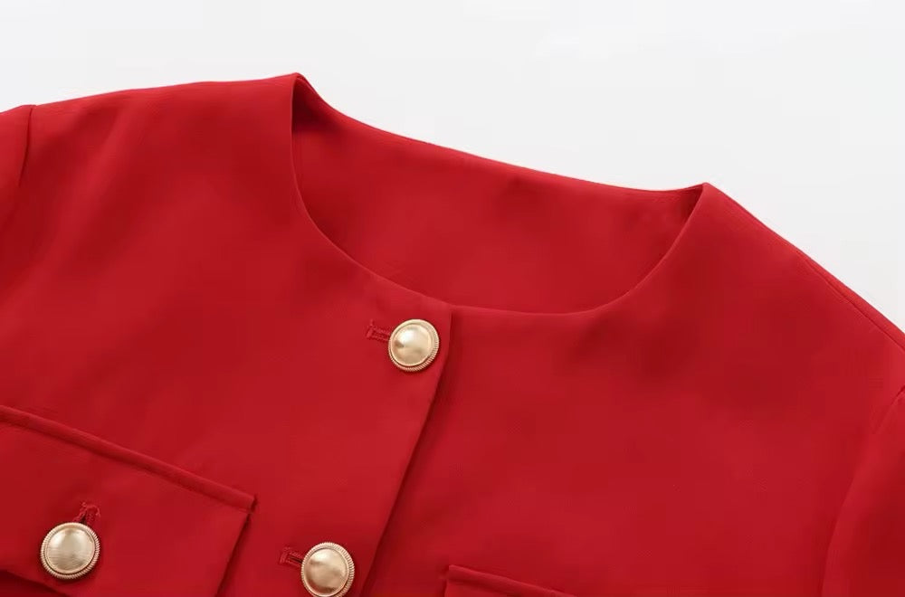 Veste courte avec bouton doré