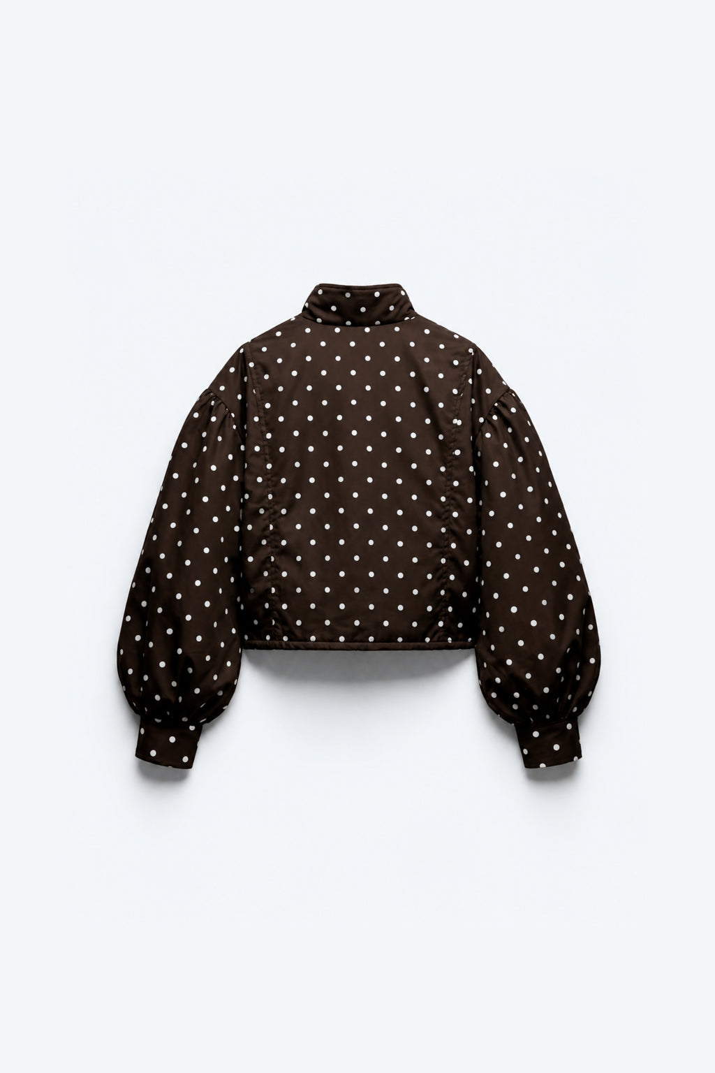 VESTE COURTE À POIS ET MANCHES BOUFFANTES