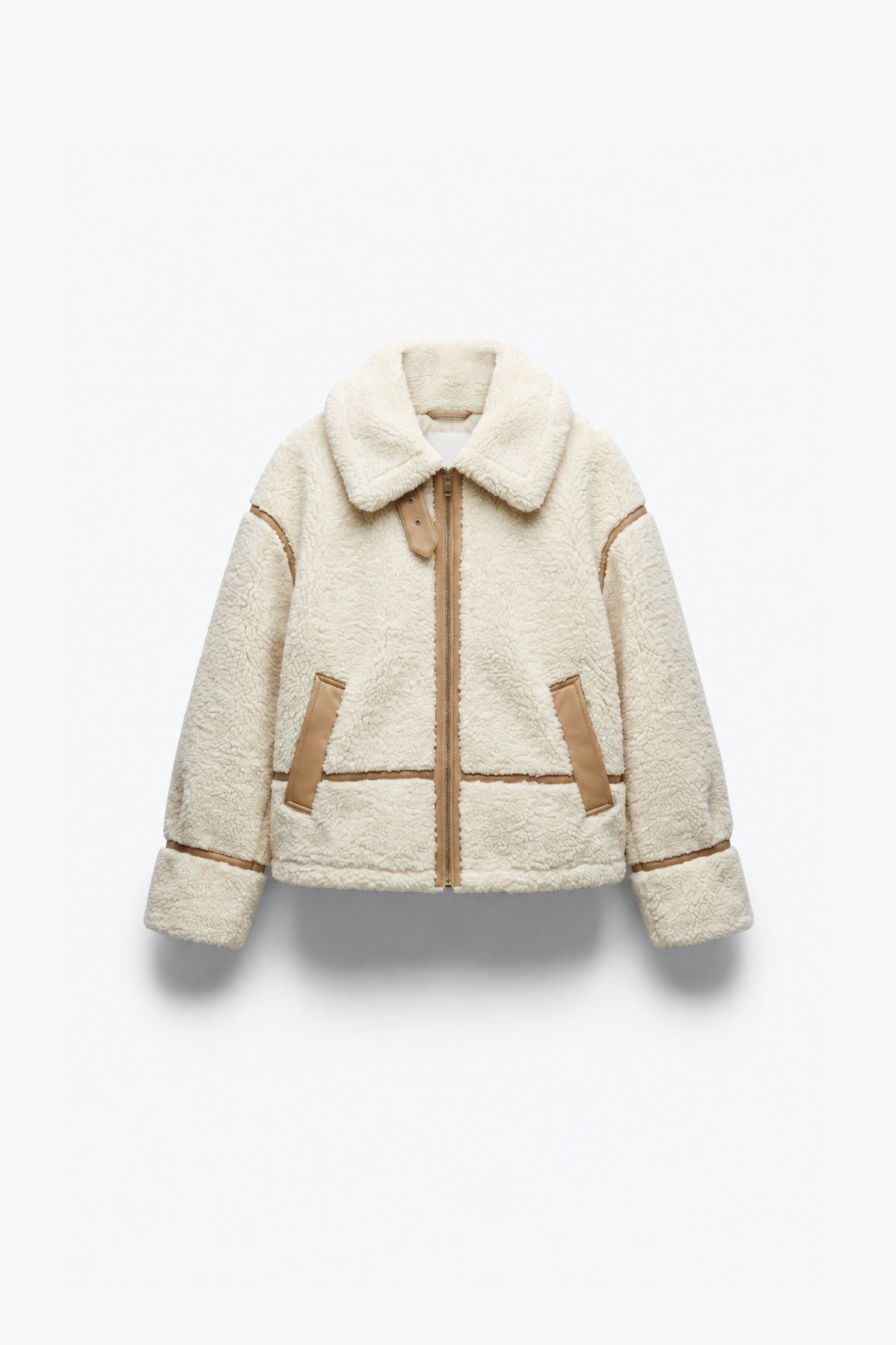 VESTE EFFET LAINE AVEC DÉTAILS CONTRASTÉS