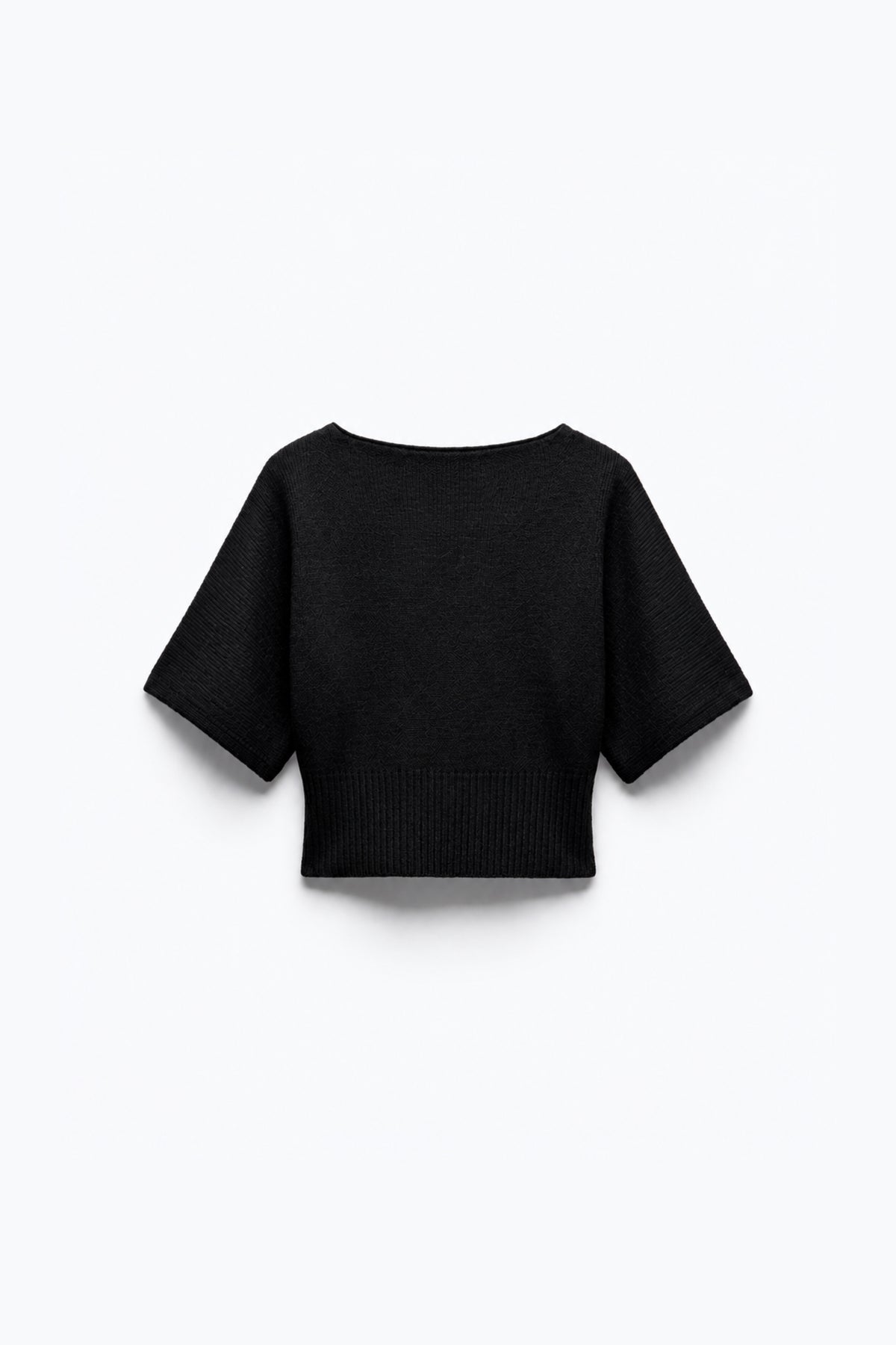 PULL COURT EN MAILLE CINTRÉ