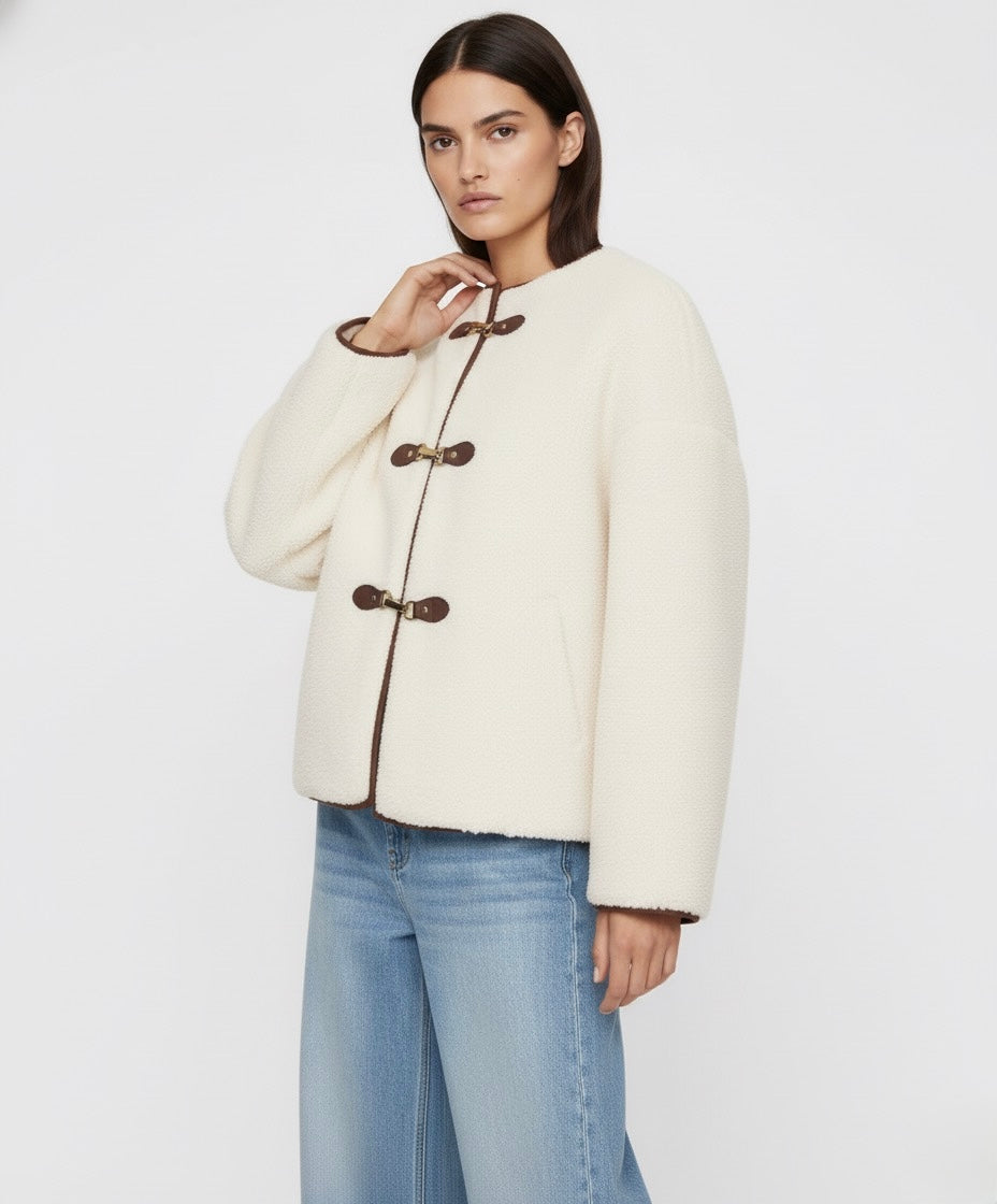 VESTE BOUCLÉE À FERMETURES MÉTALLIQUES