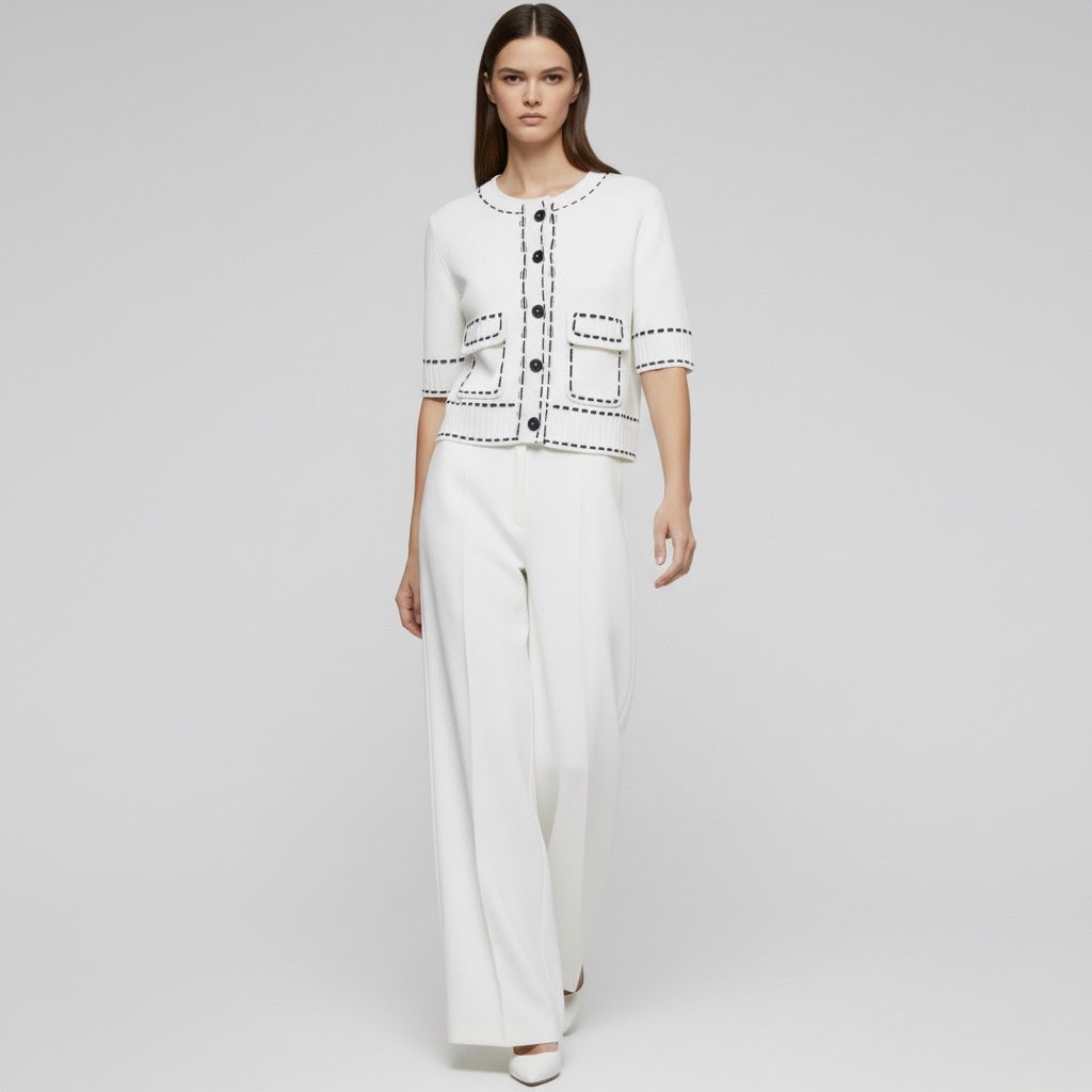 GILET COURT À BOUTONS FACETÉS